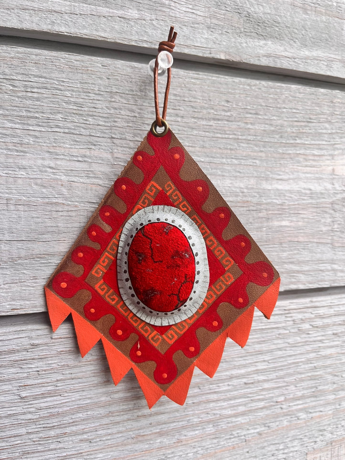 Bright red western leather ornament