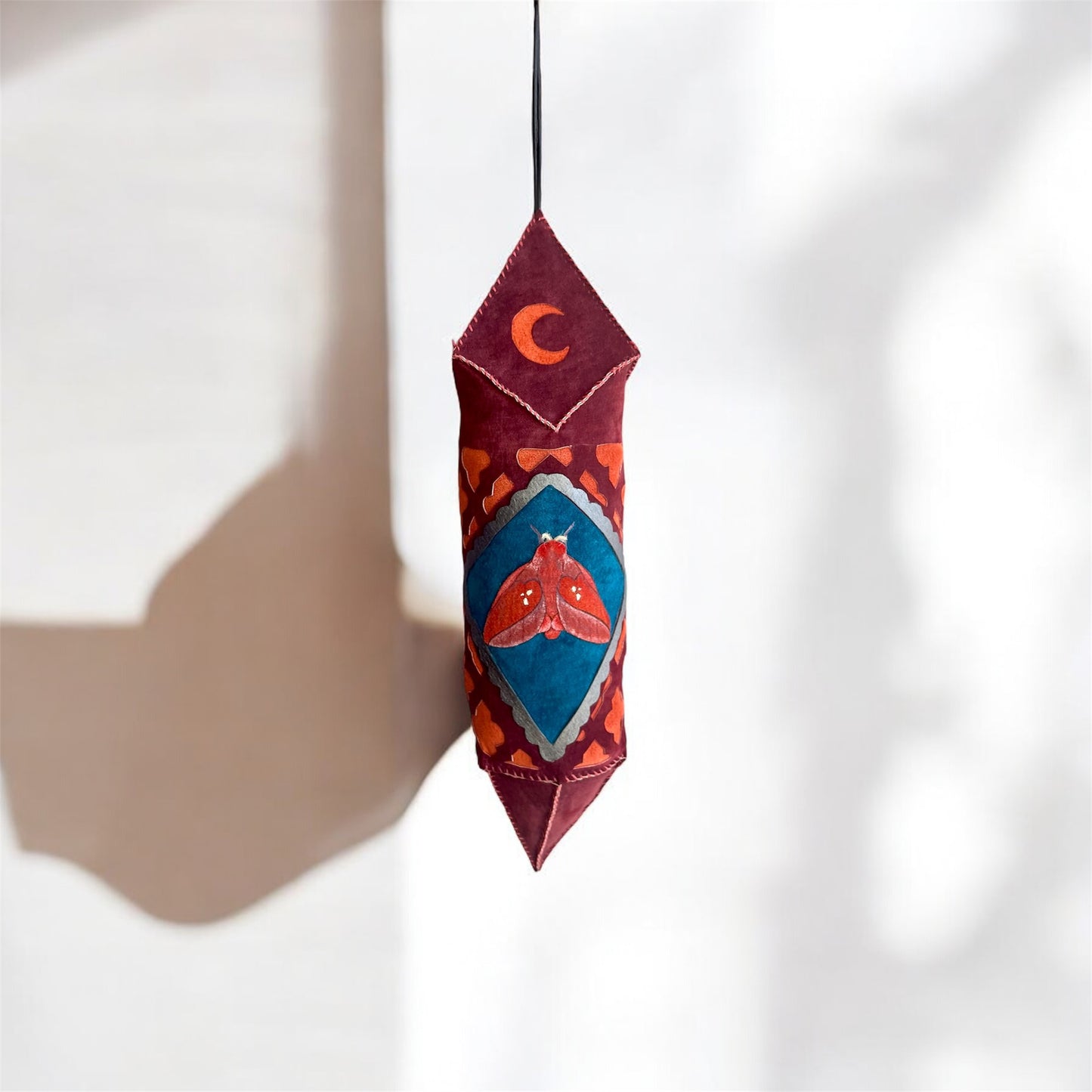 Moroccan inspired moon and moth hanging ornament